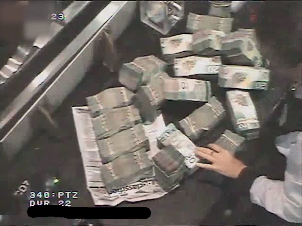 'Dirty money' is seen being exchanged at a Canadian casino. (Courtesy: Provincial Government of British Columbia)