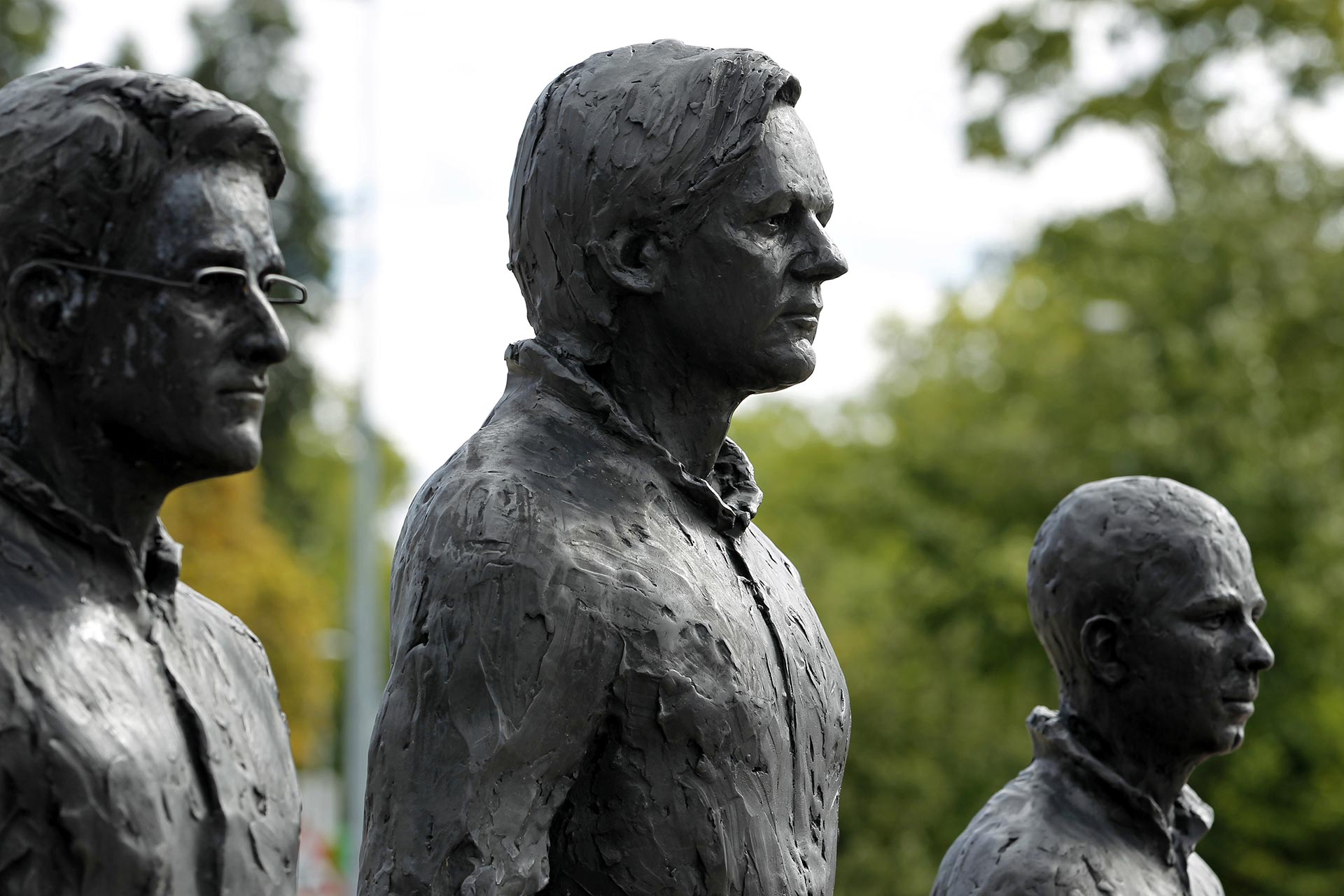 Whistleblowers Edward Snowden, Julian Assange and Chelsea Manning depicted in an art installation entitled “Anything to Say?” in an art installation outside the U.N. European headquarters in Geneva, Switzerland, in 2015. (Credit: Pierre Albouy/Reuters)