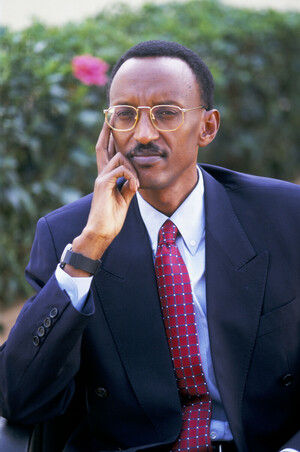 Rwandan President Paul Kagame, outside, looking at the camera