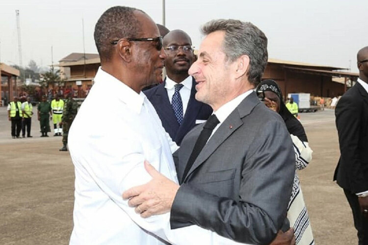 Former French President Nicolas Sarkozy meets President Alpha Condé of Guinea