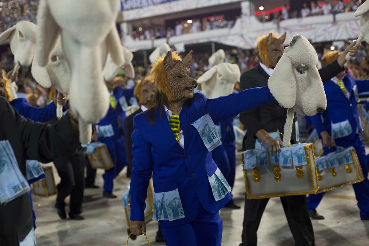 Dancers dressed as wolves in sheep clothing. (Photo AFP)